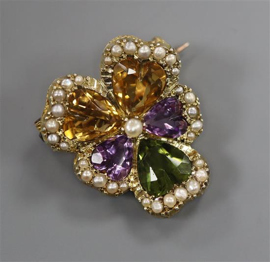 A yellow metal, coloured quartz and seed pearl set flower head brooch, 23mm.